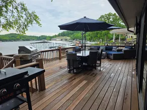 Rare level lot with boat launch on site. Wood burning fireplace. Dog friendly. - Image 5