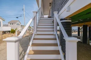 Oceanfront Escape • Walk to Beach • Sleeps 14 - Image 4