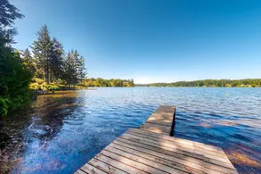 Lakefront dream with private hot tub, dock, kayaks - Image 5