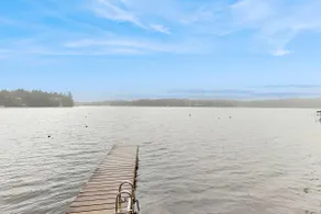 Lakefront dream with private hot tub, dock, kayaks - Image 4
