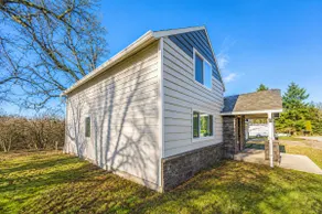 Beautiful like new home with a large hot tub in a quiet neighborhood on Acreage. - Image 2