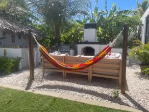 Malecon Beach House with beautiful backyard. Steps from the Caribbean ocean. - Image 3