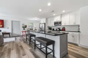 Spacious Renovated Home with Fenced Yard - Image 3
