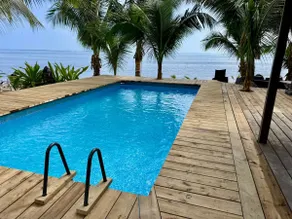 Beachfront Bungalows With Sunset Views in Haapiti - Image 3