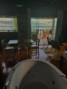 Lagoon Cottage Hot tub and lagoon view - Image 5