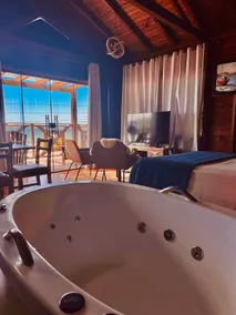Lagoon Cottage Hot tub and lagoon view - Image 2