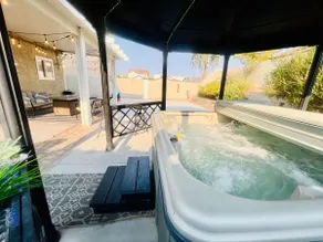 Beachy themed with free hot tub & outdoor firepit - Image 5