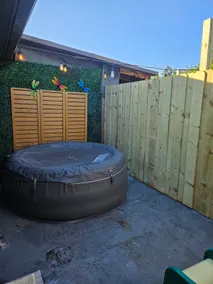 Cozy home with free parking + jacuzzi. - Image 4
