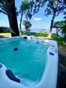 Open water view: cozy hot tub & fire pit with dock - Image 4