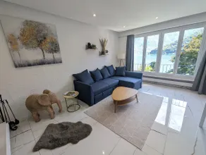 Modern apartment with lake view, fireplace & parking - Image 2
