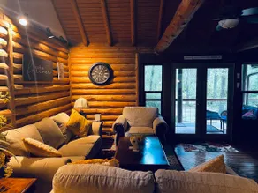 A charming cedar log cabin tucked in the woods. - Image 3