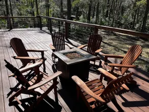 A charming cedar log cabin tucked in the woods. - Image 4