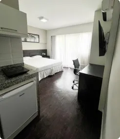 Flat Orla Pampulha-Mineirão: Balcony and Kitchen - Image 5