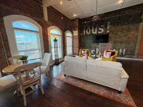 Stylish Boutique Loft, Vintage Coca-Cola Mural - Image 2