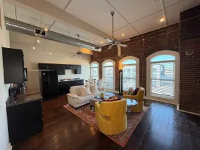 Stylish Boutique Loft, Vintage Coca-Cola Mural - Image 4