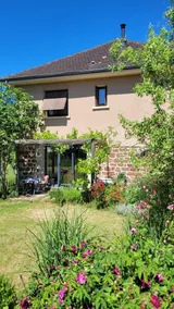 A family home with a landscaped garden - Image 2