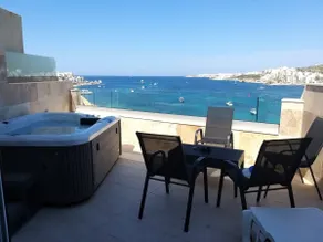 DuplexPenthouse seafront with hot tub by Homely - Image 3
