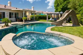Home Theater, Arcade games, Water Slide, Lagoon-Style Pool & Extra-Large Spa - Image 4