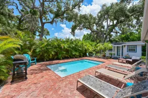 Historic 1930s Cottage + Heated Pool + 12mi to beaches & 1 mi to downtown - Image 5