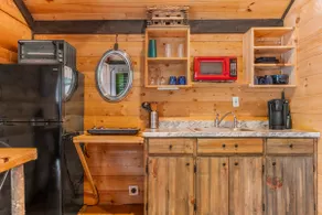 Cozy Wooded Cabin in the Heart of RRG! - Image 2