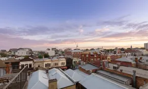 Sunrise rooftop views above eclectic Fitzroy - Image 5