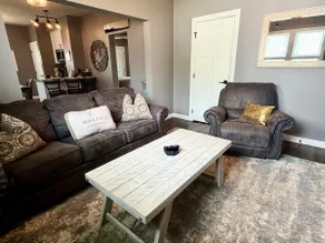 The Lounge: Hot Tub • 86” TV • Golf • Fenced Yard - Image 5