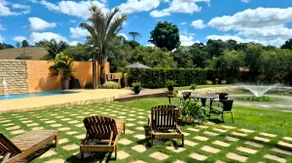Retreat with illuminated lake, swimming pool and gourmet area - Image 5
