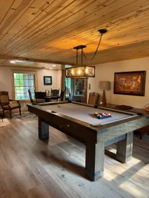 Cozy 2 bedroom cabin with fireplace, lake views, steps to sand bottom swimming - Image 3