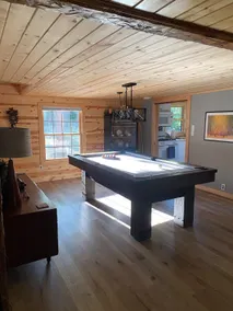 Cozy 2 bedroom cabin with fireplace, lake views, steps to sand bottom swimming  - Image 4