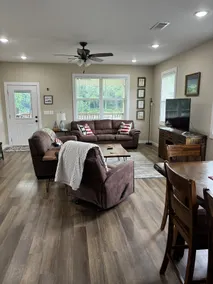 Riverfront getaway with steps to fishing paradise. - Image 3