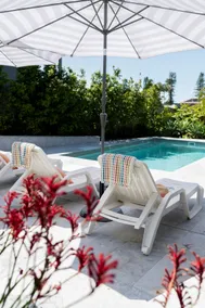 Seaside Haven with pool just steps to the beach - Image 5
