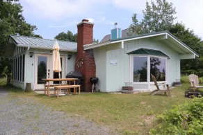 Lakefront Cottage with Retro Vibe, Modern Comforts - Image 2