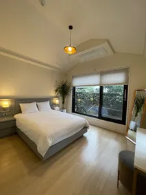 Feel the complete rest at the private house Jeju Gamsung Accommodation Stone Wall House - Image 2