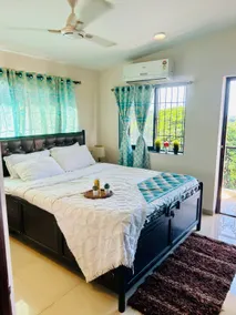 Stylish 1BHK- Comfy Bed, Clean Washroom & Wi-Fi - Image 2