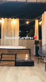 Uai House Mg features a Jacuzzi with a retractable roof top - Image 3