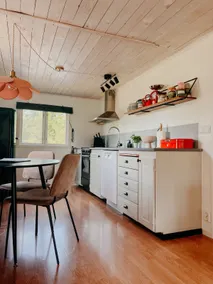 Luxurious red cottage with wood stove near lake - Image 3