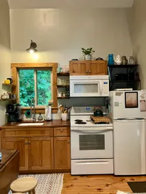 Whimsical Creekside Cabin - Image 4