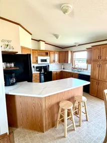 Three bedroom home on a large lot with a lake view - Image 3