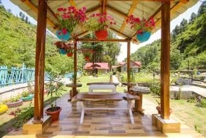 GuestFav Elite 2BHK RiverVille • Lawn • WiFi • BNfire BBQ - Image 3
