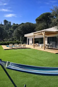 House surrounded by nature with a pool - Image 3