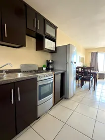 Unwind in a spacious 3-bedroom apartment with pool - Image 3