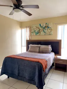 Unwind in a spacious 3-bedroom apartment with pool - Image 5