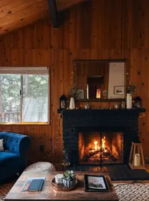 The Oak & Ember Cabin | Fireplace • Screening Room - Image 3