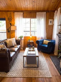 The Oak & Ember Cabin | Fireplace • Screening Room - Image 5