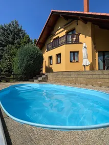 Vacation home with a heated pool and a fireplace - Image 3