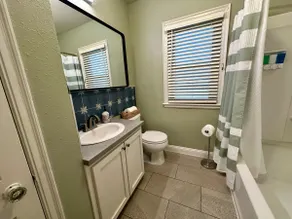 Spacious Family Home with Fenced Yard - Image 5