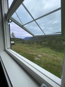 Cozy off-grid cabin at Hellesætre – stunning views - Image 3
