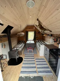 Cozy off-grid cabin at Hellesætre – stunning views - Image 4