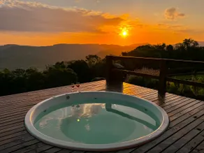 Vale do Sol Retreat • Hydro, fireplace and sunset - Image 4