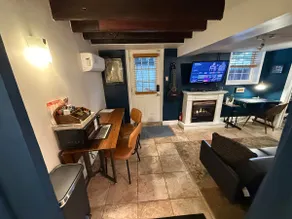 Academy Guesthouse with a Fireplace and Courtyard - Image 4